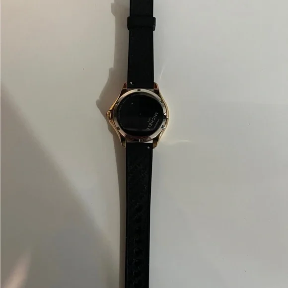 Only worn a few times. Black and rose gold with diamonds